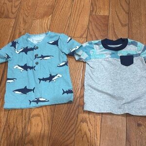 2 Carter’s short sleeve shirts- sharks and camo blues. Blue and gray